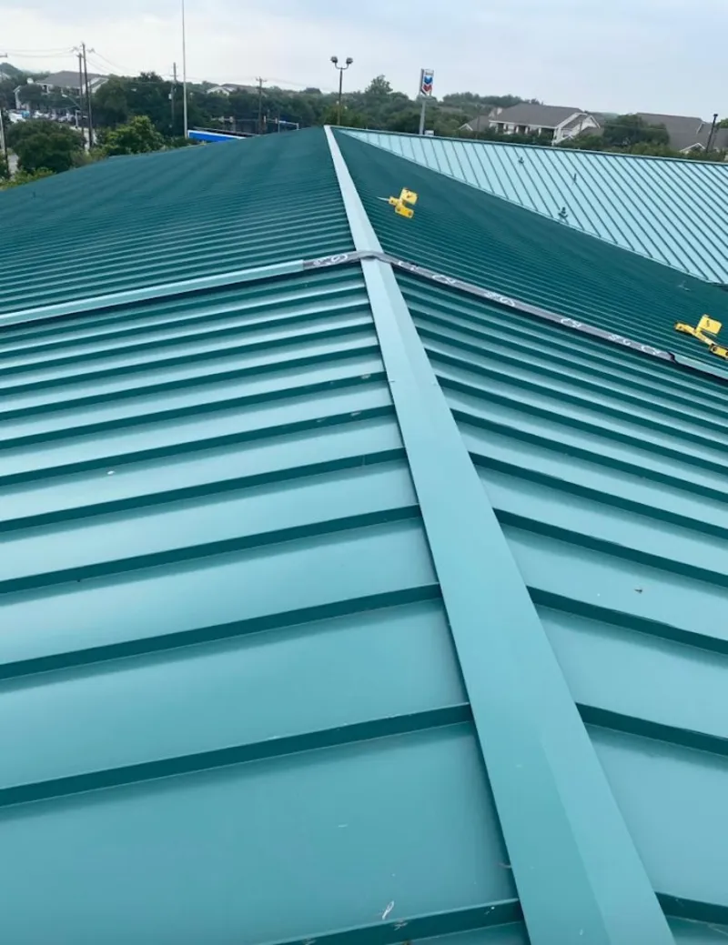 Green commercial metal roof ridge and valley for Metal Roof Repair in Nibley